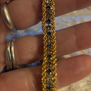 Elegant Gold tone with Blue and clear rhinestones Bracelet
7”